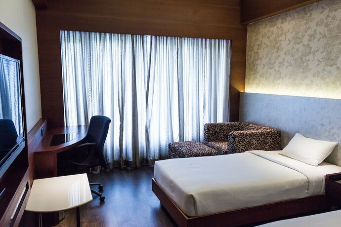 Imagen de la habitación del Hotel Diana Heights. Foto 17