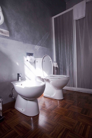 Imagen de la habitación del Hotel Diana, Lucca. Foto 17