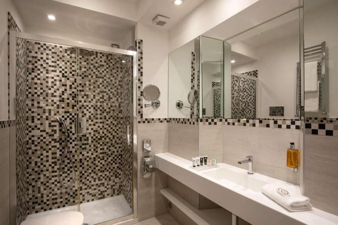 Imagen de la habitación del Hotel Diana Roof Garden. Foto 5