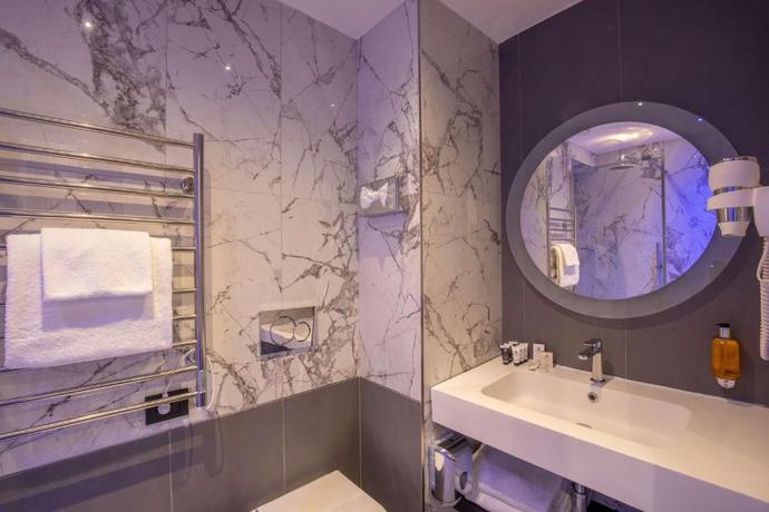 Imagen de la habitación del Hotel Diana Roof Garden. Foto 6