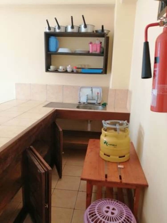 Imagen de la habitación del Hotel Diani Gift Guest House. Foto 5