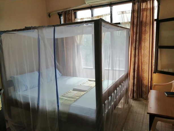 Imagen de la habitación del Hotel Diani Gift Guest House. Foto 7