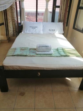 Imagen de la habitación del Hotel Diani Gift Guest House. Foto 9