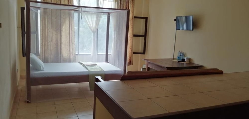 Imagen de la habitación del Hotel Diani Gift Guest House. Foto 10