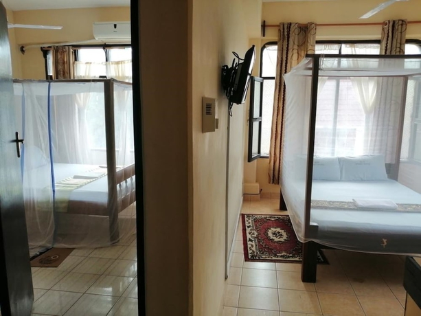 Imagen de la habitación del Hotel Diani Gift Guest House. Foto 11