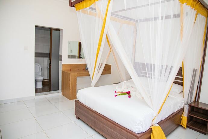 Imagen de la habitación del Hotel Diani Palm Resort. Foto 12
