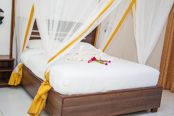 Imagen de la habitación del Hotel Diani Palm Resort. Foto 16