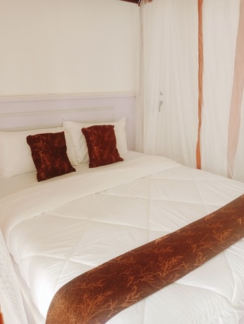 Imagen de la habitación del Hotel Diani Palm Resort. Foto 18
