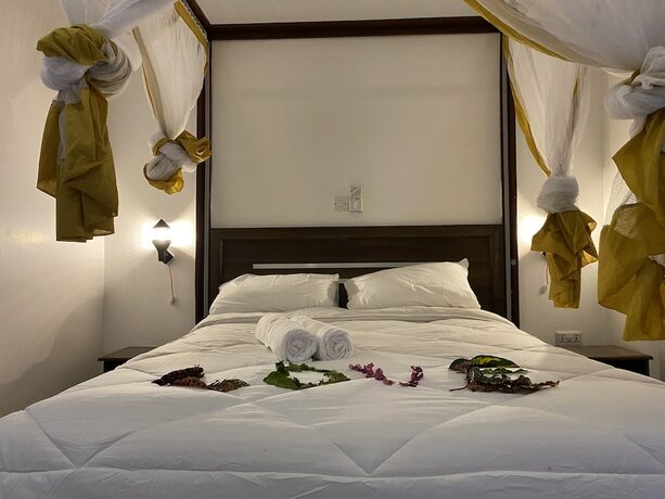 Imagen de la habitación del Hotel Diani Palm Resort. Foto 19