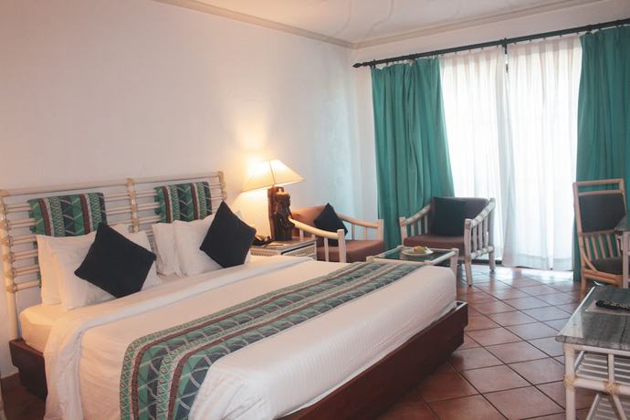 Imagen de la habitación del Hotel Diani Reef Beach Resort and Spa. Foto 7