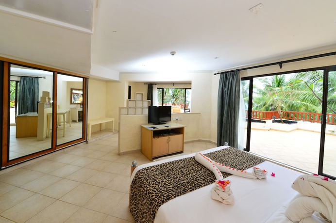 Imagen de la habitación del Hotel Diani Reef Beach Resort and Spa. Foto 8