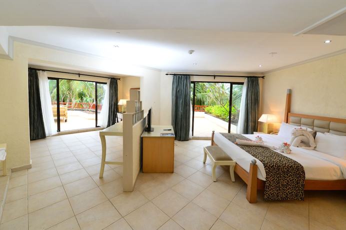 Imagen de la habitación del Hotel Diani Reef Beach Resort and Spa. Foto 11