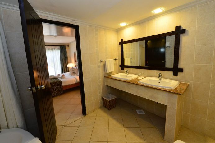 Imagen de la habitación del Hotel Diani Reef Beach Resort and Spa. Foto 14