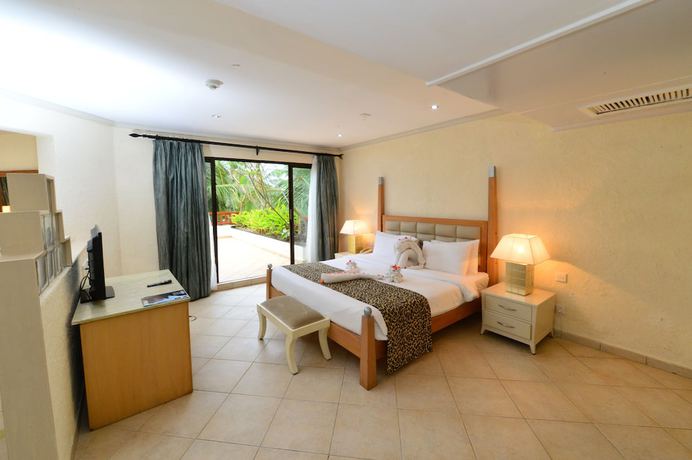 Imagen de la habitación del Hotel Diani Reef Beach Resort and Spa. Foto 16