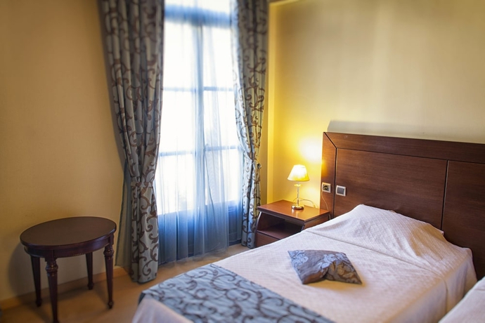 Imagen de la habitación del Hotel Dias. Foto 11