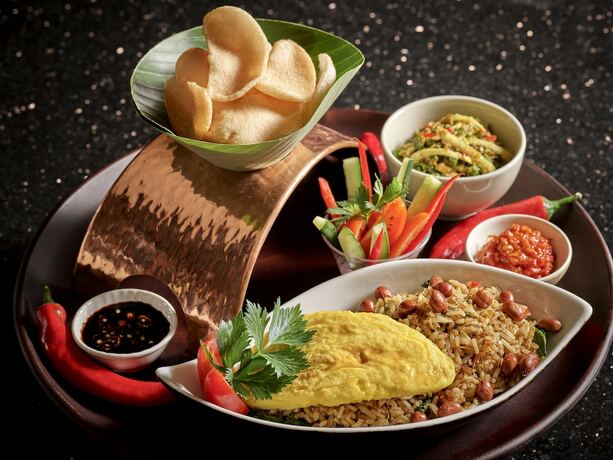 Imagen del bar/restaurante del Hotel Diatas By Art Cafe Bumbu Bali. Foto 4