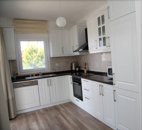 Imagen de la habitación del Hotel Dibek Homes Villa &. Foto 4