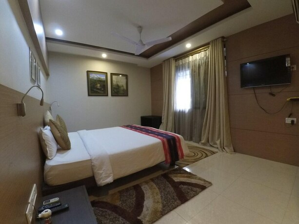 Imagen general del Hotel Dibrugarh Club House. Foto 4