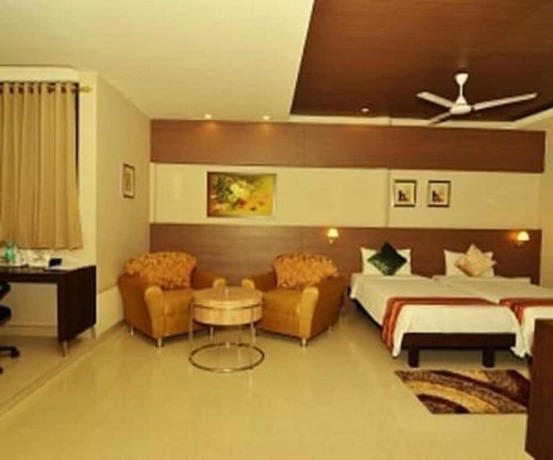 Imagen de la habitación del Hotel Dibrugarh Club House. Foto 24