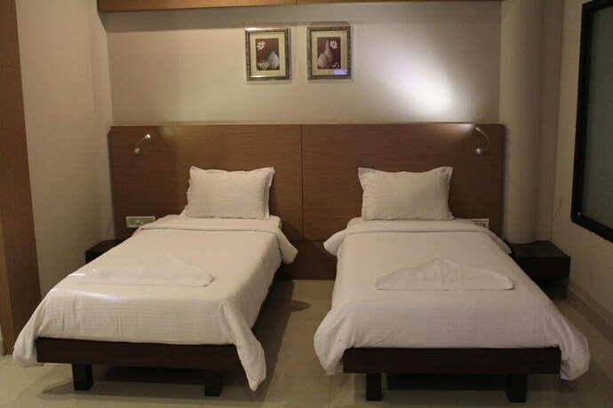 Imagen de la habitación del Hotel Dibrugarh Club House. Foto 36