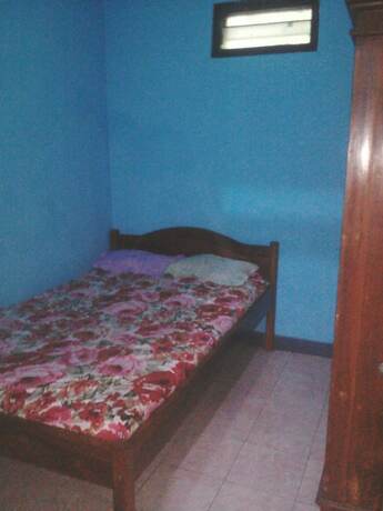Imagen de la habitación del Hotel Dibyo Homestay. Foto 8