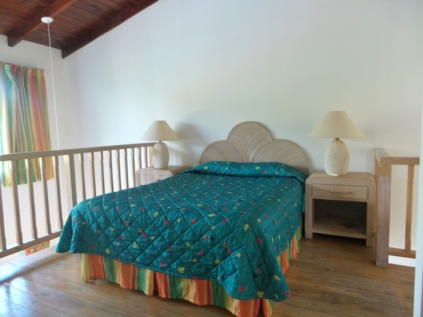 Imagen de la habitación del Hotel Dickenson Bay Cottages. Foto 4