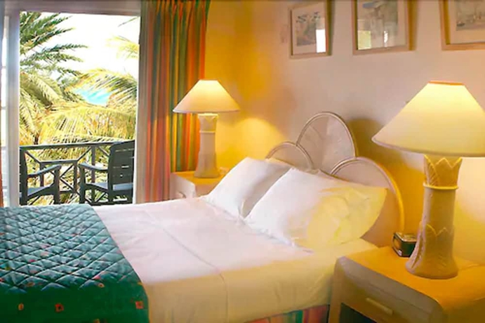 Imagen de la habitación del Hotel Dickenson Bay Cottages. Foto 5