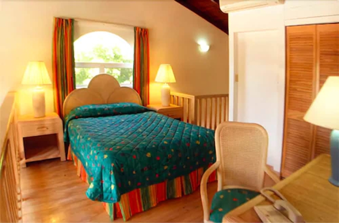 Imagen de la habitación del Hotel Dickenson Bay Cottages. Foto 6