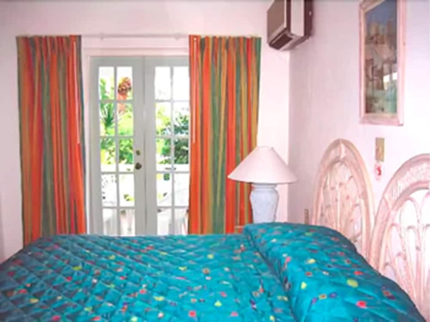 Imagen de la habitación del Hotel Dickenson Bay Cottages. Foto 8