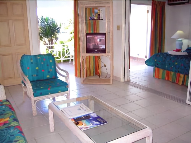 Imagen de la habitación del Hotel Dickenson Bay Cottages. Foto 11