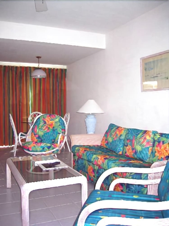 Imagen de la habitación del Hotel Dickenson Bay Cottages. Foto 12