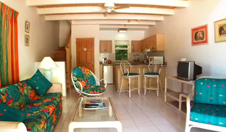 Imagen de la habitación del Hotel Dickenson Bay Cottages. Foto 14