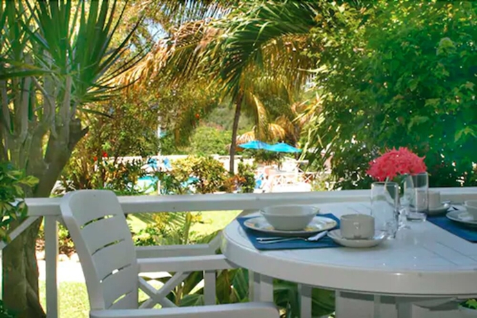 Imagen de la habitación del Hotel Dickenson Bay Cottages. Foto 17