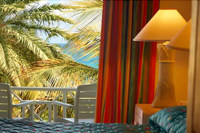 Imagen de la habitación del Hotel Dickenson Bay Cottages. Foto 18