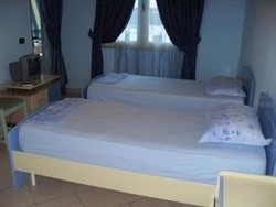 Imagen de la habitación del Hotel Dick's Sons Hotel. Foto 4