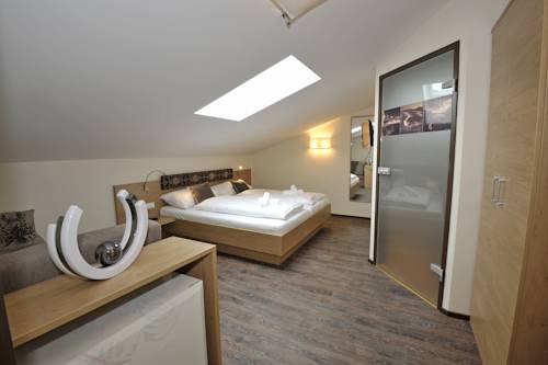Imagen de la habitación del Hotel Die Bergerin - Appartements Schladming. Foto 11