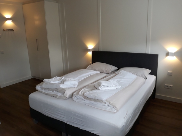 Imagen de la habitación del Hotel Die Zwei L&ouml;wen Ferienwohnungen. Foto 10