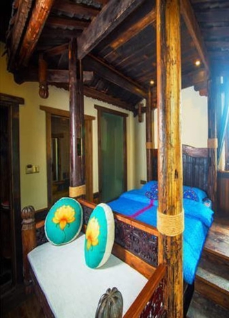 Imagen de la habitación del Hotel Dielianhua Cowherd Inn Zhangjiajie. Foto 6