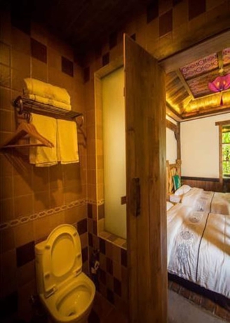 Imagen de la habitación del Hotel Dielianhua Cowherd Inn Zhangjiajie. Foto 11