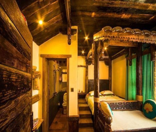 Imagen de la habitación del Hotel Dielianhua Cowherd Inn Zhangjiajie. Foto 14