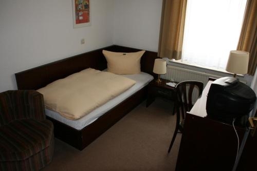 Imagen de la habitación del Hotel Diening. Foto 9