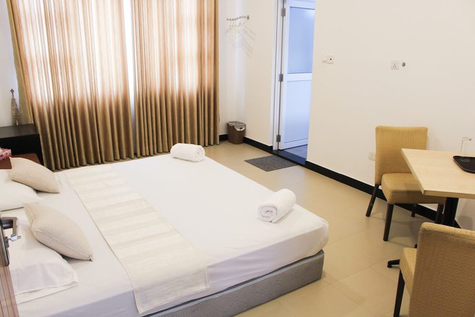 Imagen de la habitación del Hotel Digana Villa. Foto 3