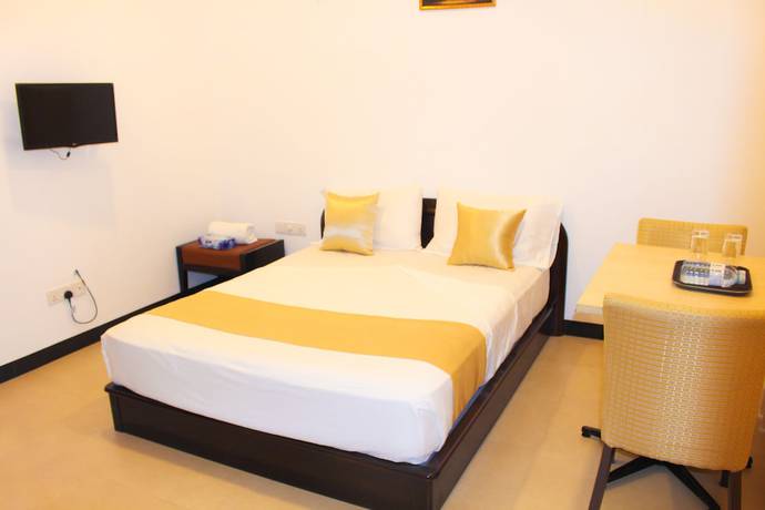 Imagen de la habitación del Hotel Digana Villa. Foto 5