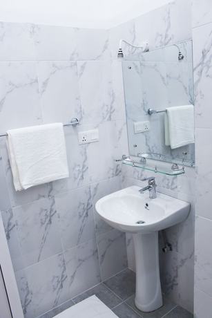 Imagen de la habitación del Hotel Digana Villa. Foto 8