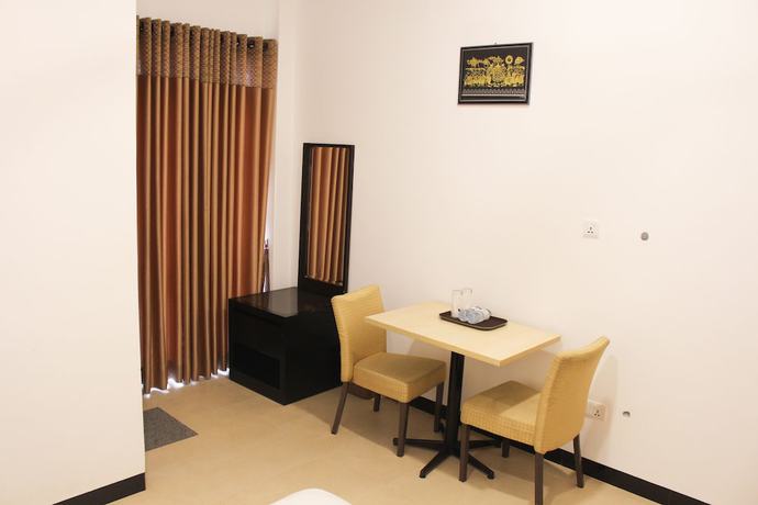 Imagen de la habitación del Hotel Digana Villa. Foto 10