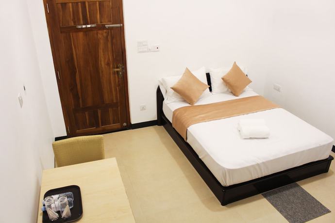 Imagen de la habitación del Hotel Digana Villa. Foto 12