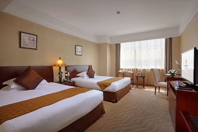 Imagen de la habitación del Hotel Dijon Shanghai. Foto 3