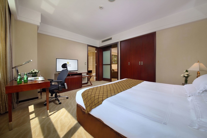 Imagen de la habitación del Hotel Dijon Shanghai. Foto 6