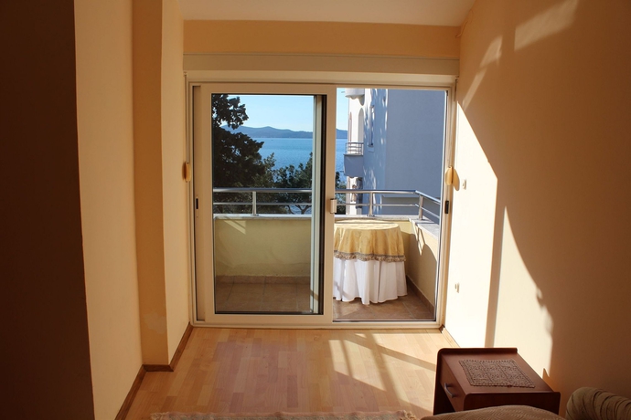 Imagen de la habitación del Hotel Diklo Beach Rooms. Foto 3