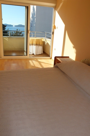 Imagen de la habitación del Hotel Diklo Beach Rooms. Foto 5